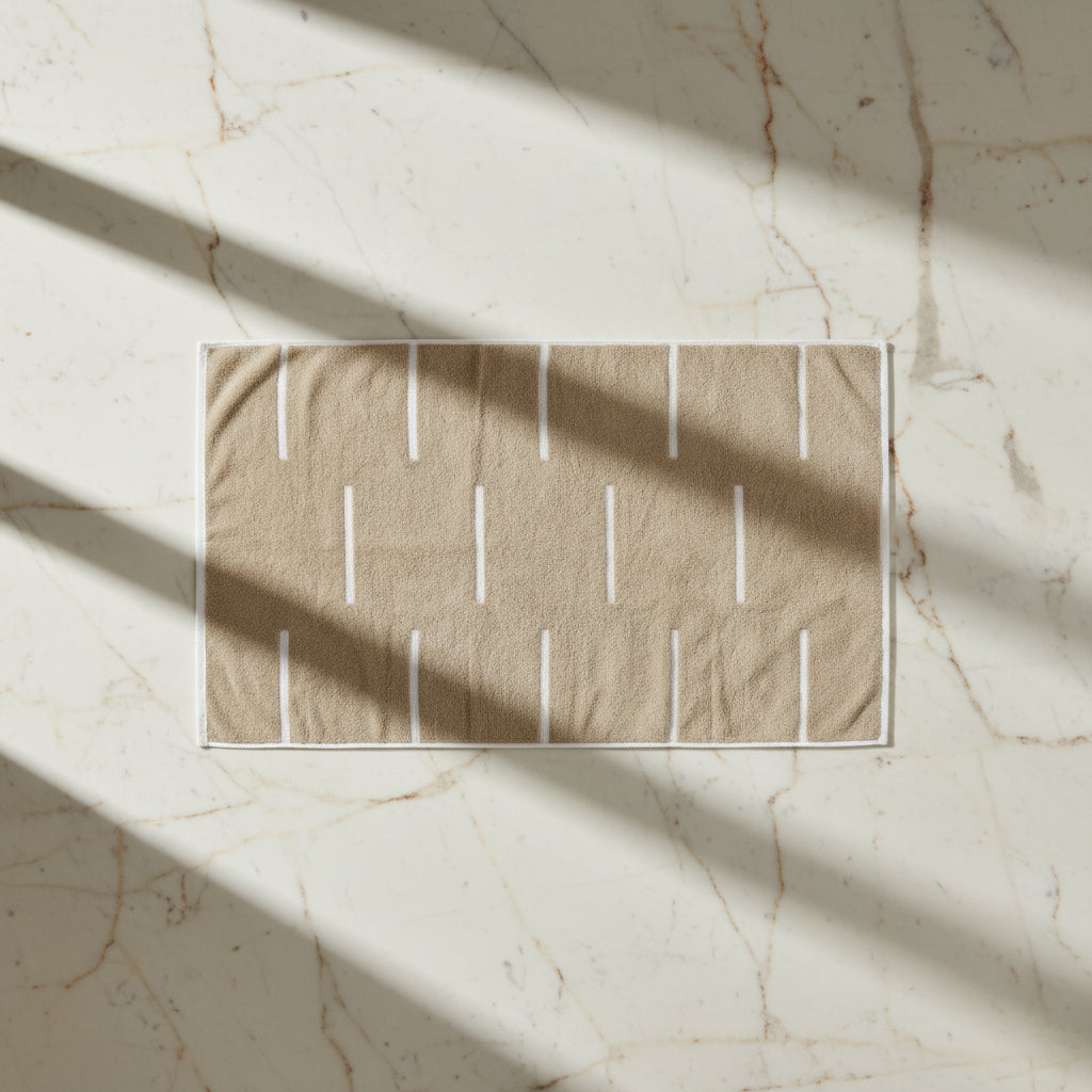 Beige fabric with white vertical stripes on a beige background