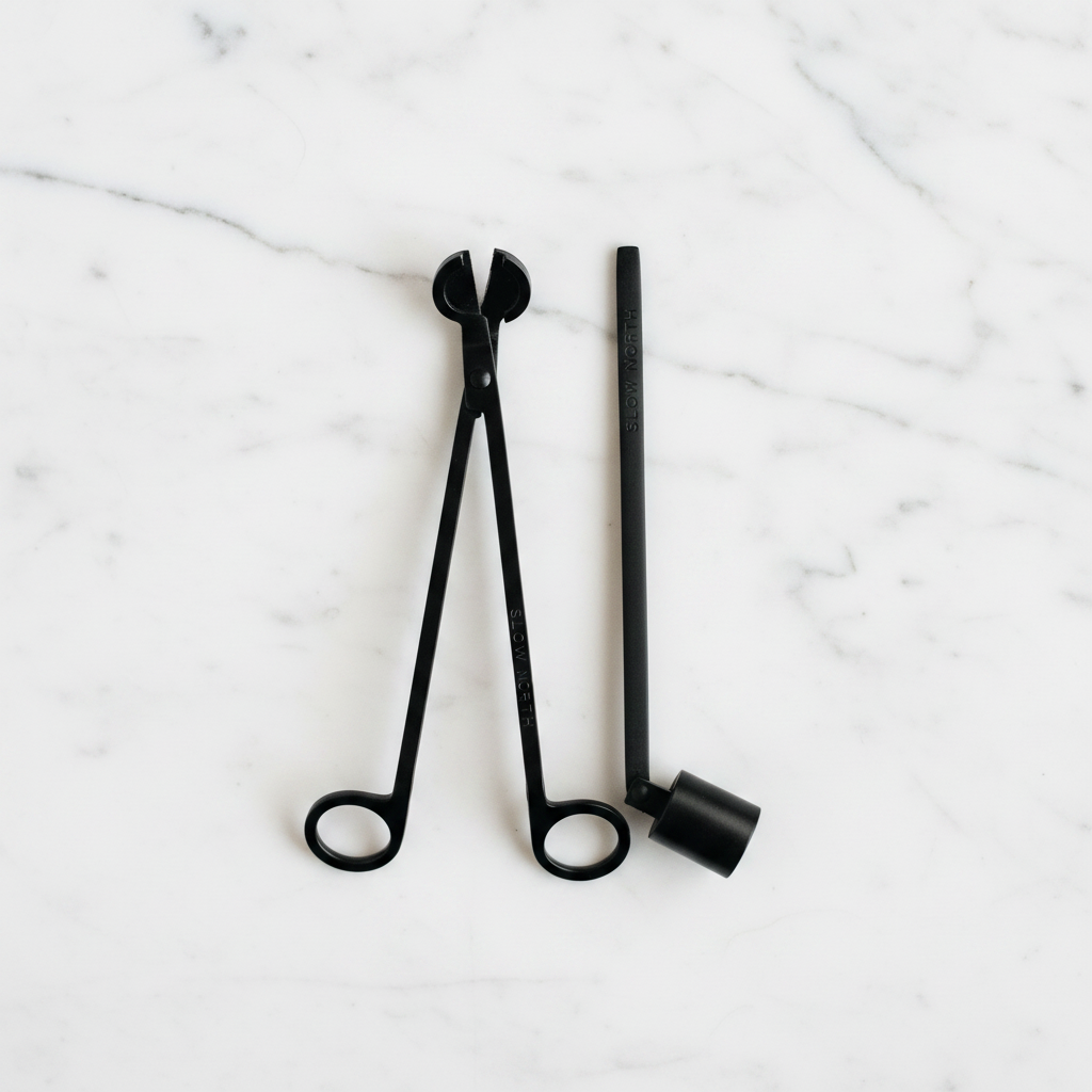 Candle Care Tool Set with candle snuffer and candle trimmer on a light surface.