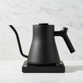 Fellow Stagg EKG Pro stovetop kettle in Matte Black on a light background.