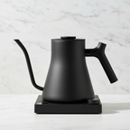 Fellow Stagg EKG Pro stovetop kettle in Matte Black on a light background.