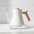 Fellow Stagg EKG Pro Electric Kettle - Matte White w/ Maple LAH Hero on a light background