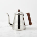 Kalita Wave Stainless Steel Gooseneck Kettle - 1 Liter -on a light background.