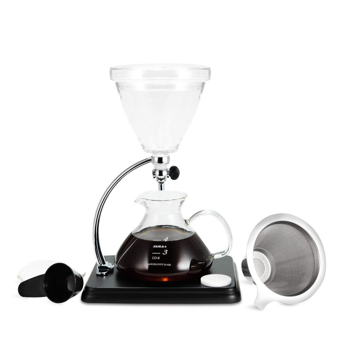 Yama silverton coffee brewing apparatus with glass carafe and black base on a white background