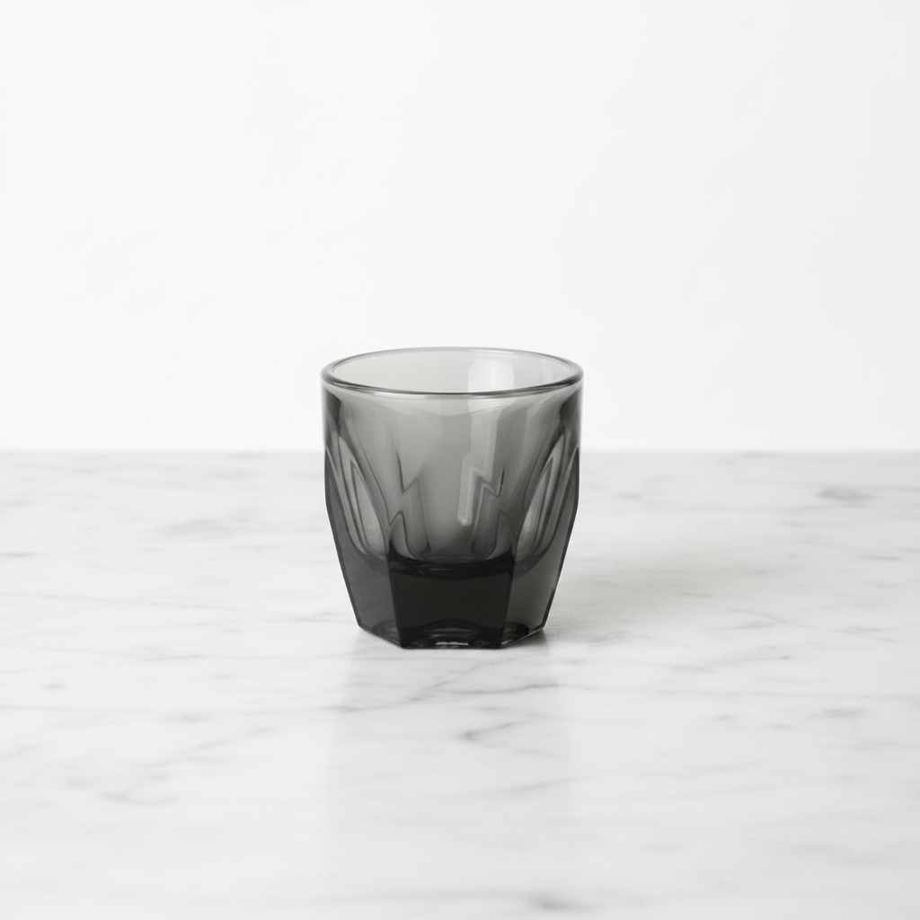 Vero Smoke Cortado 4.25 ounce glass on a light background and surface