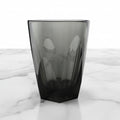 Vero Latte Glass (12oz) - Smoke, on a white marble surface.